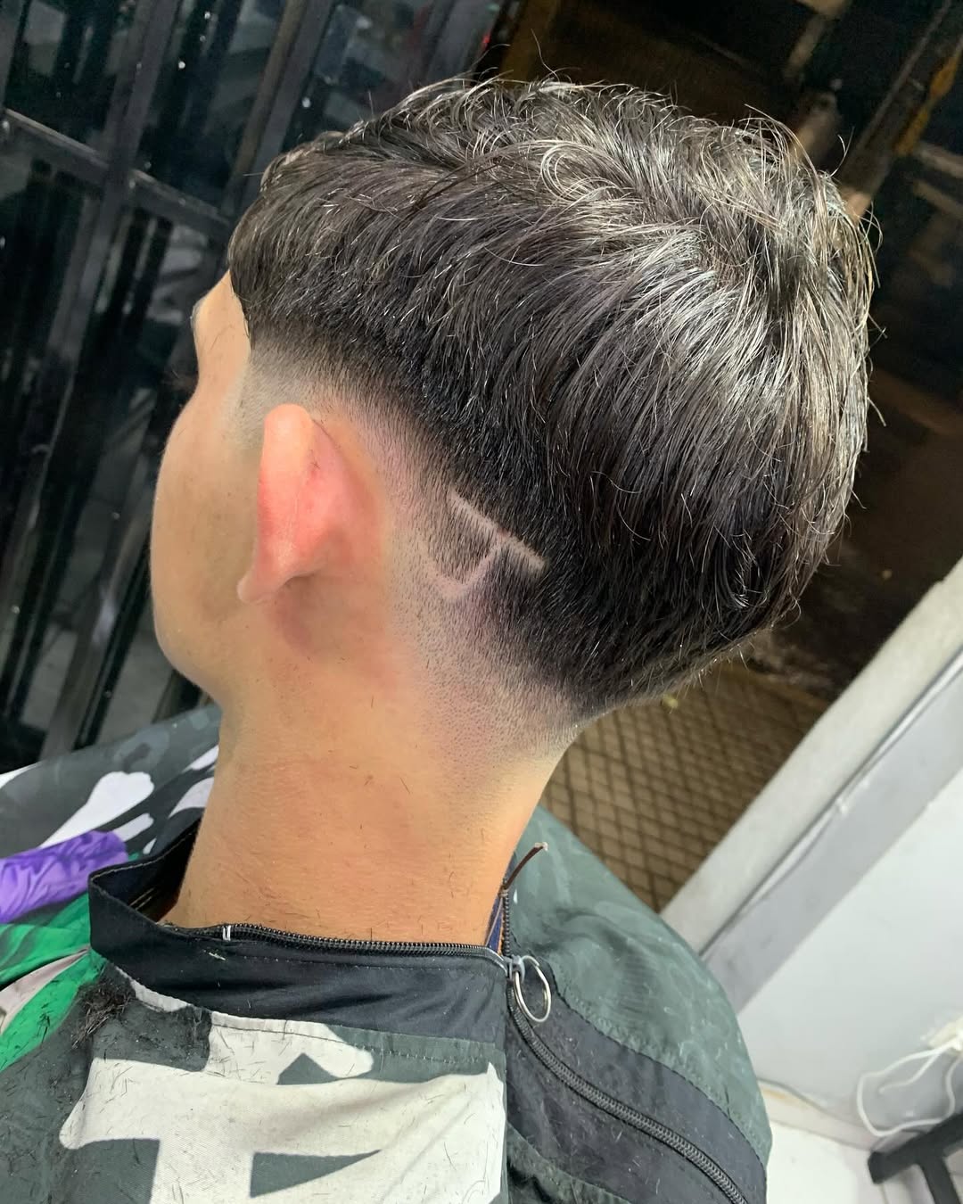 Corte masculino com degradê feito na New Style Barbearia
